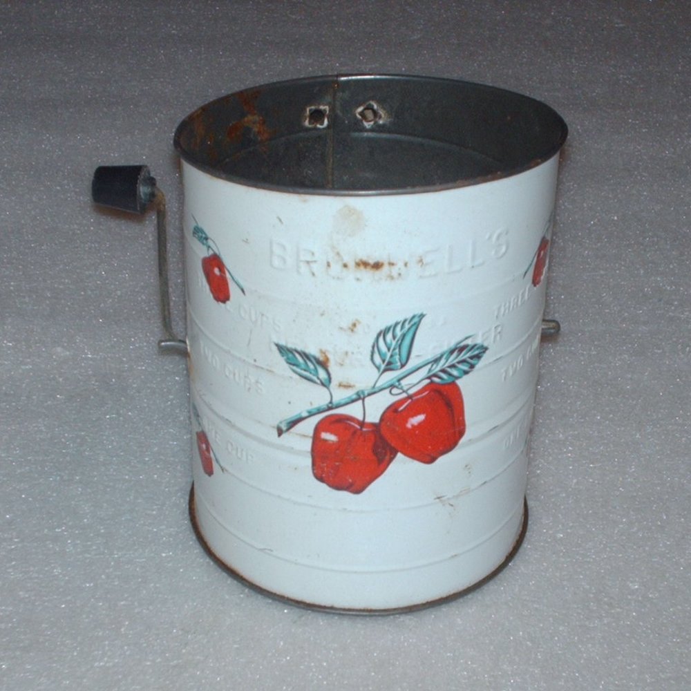 Vintage Bromwell's advertising metal flour sifter